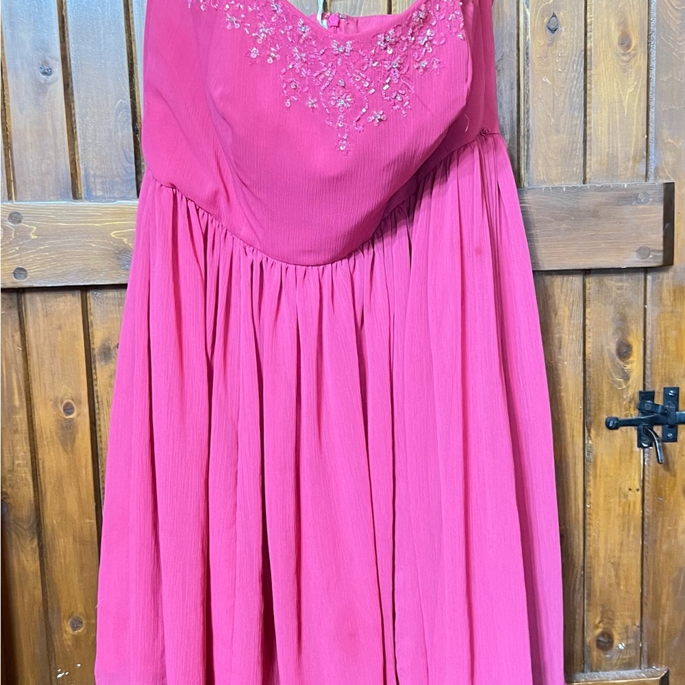 Elegant Pink Strapless Dress with Embellished Neckline